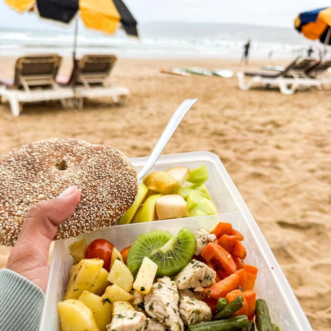 Fresh meal with fruit and vegetables served on the beach