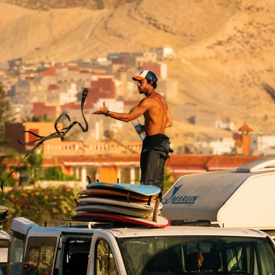 Mohamed Stafazi with surfboards on the Moroccan coast